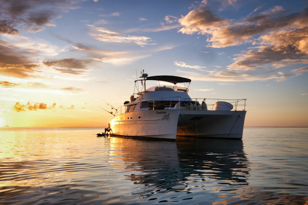 Madagascar, catamaran Hinatea with sunset